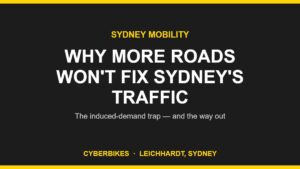 Cyberbikes charcoal-and-yellow graphic reading Why More Roads Won't Fix Sydney's Traffic, on induced demand