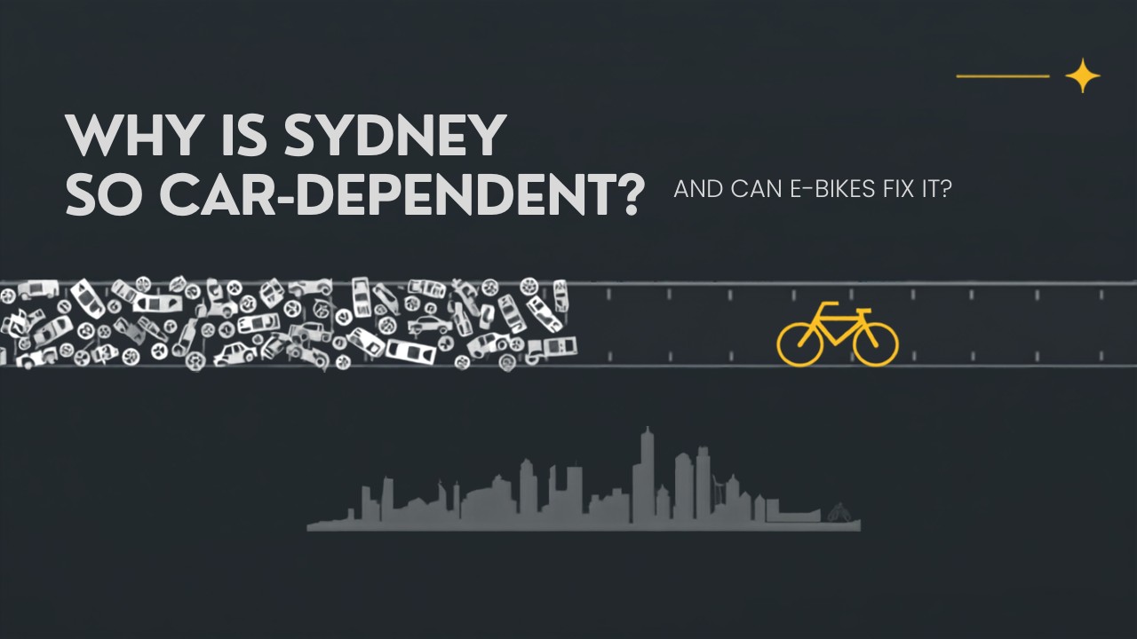 Cyberbikes banner: rows of cars giving way to a single e-bike over a Sydney skyline, asking why Sydney is so car-dependent and can e-bikes fix it